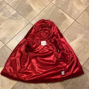 A red vest from the brand urban republic it is a size 14/16